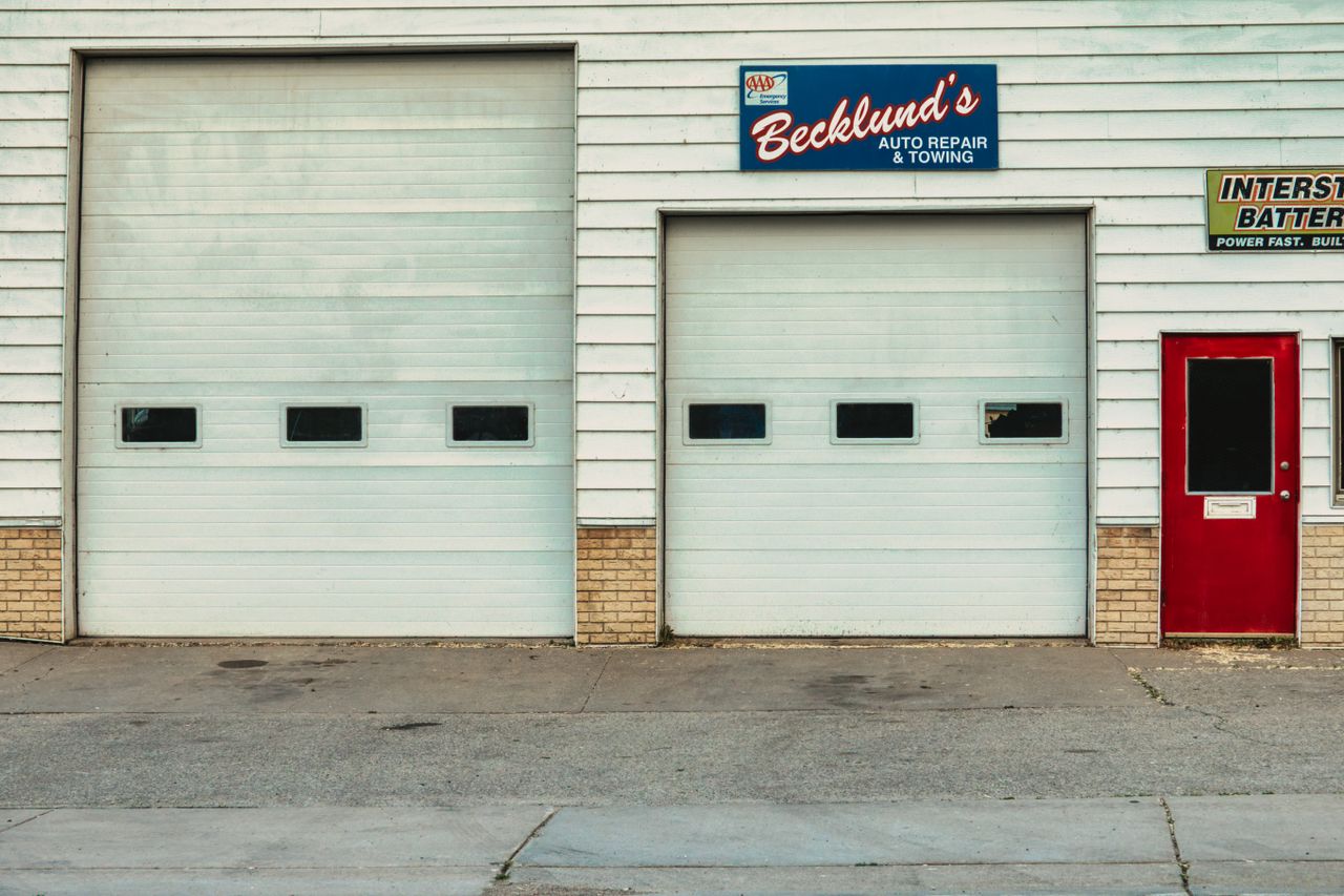 Small auto repair shop with roll-up service doors